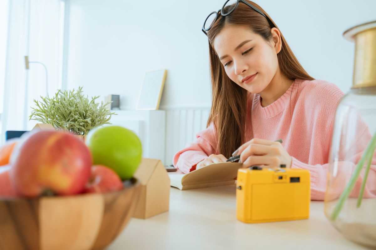 Mom doing online grocery as part of her postpartum wellness recovery