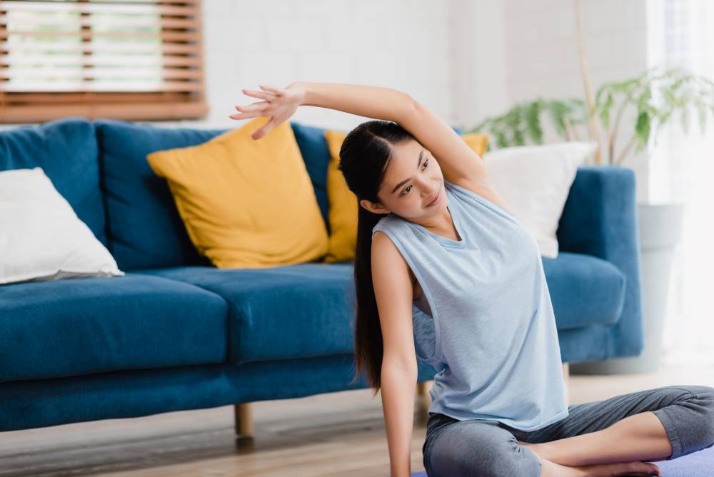 Mom exercising in her postpartum confinement