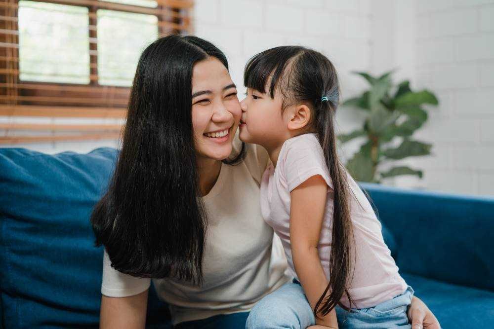 Mom playing healthy kid